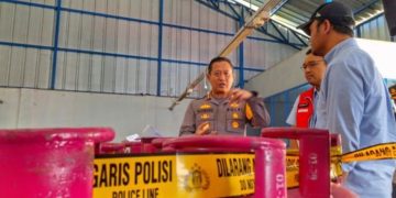 Gudang yang menjalankan praktik pengoplosan LPG ilegal di Desa Malakasari, Kecamatan Baleendah, Kabupaten Bandung, yang dibongkar Satreskrim Polresta Bandung. Empat orang diamankan dan ditetapkan tersangka.(Foto: Istimewa)