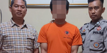 Terduga pencuri domba putih totol hitam ditangkap aparat Polres Garut di Cikajang Kabupaten Garut.