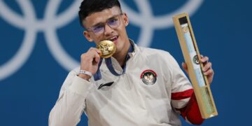 Lifter kebanggaan Indonesia, Rizki Juniansyah mempersembahkan medali emas kedua buat Tim Indonesia di Olimpiade Paris 2024. (Foto:NOC Indonesia/Naif Muhammad Al'as)