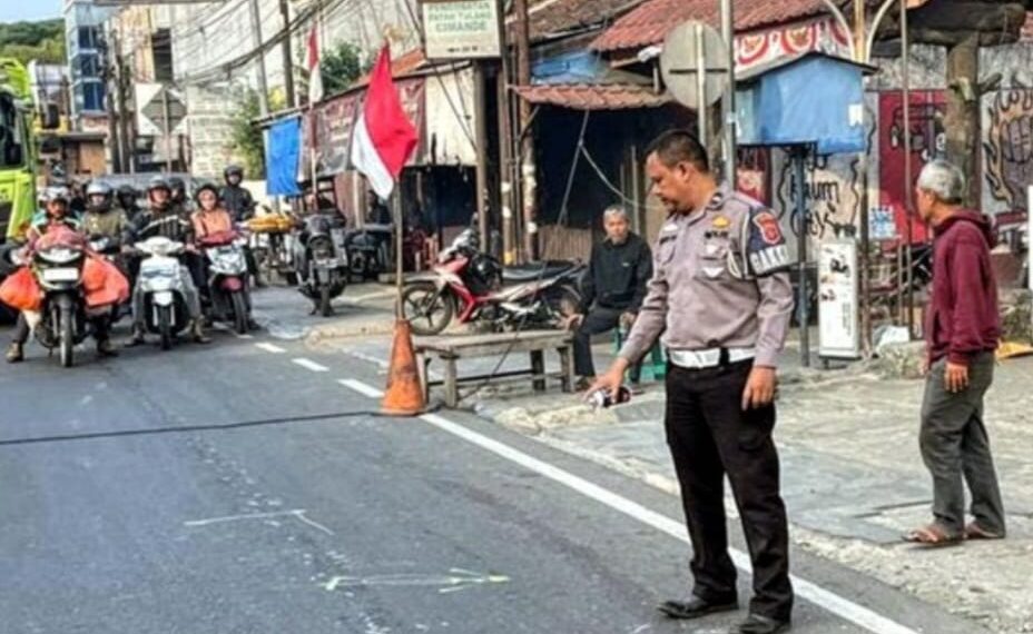 Tempat kejadian perkara (TKP) siswa SD tergilas truk setelah terjatuh dari sepeda motor di Sukabumi.(Foto:Istimewa)