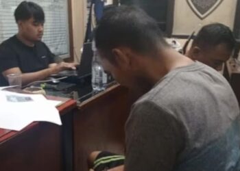 Hilman, pelaku pembunuhan terhadap istrinya, Nunung, menjalani pemeriksaan penyidik Satreskrim Polres Sumedang.(Foto:Istimewa).