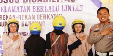 Bantuan helm untuk kalangan disabilitas