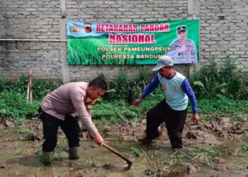 'Action' Kapolsek Pameungpeuk, AKP Asep Dedi garap 6.000 Meter lahan tidak produktif dukung misi Asta Cita Presiden Prabowo Subianto.(Foto:Istimewa).