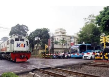 Perlintasan kereta api sebidang.(Foto:Istimewa).