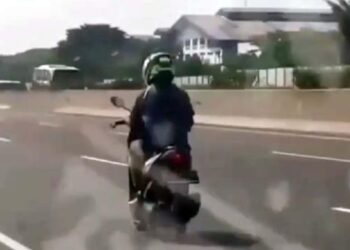Ilustrasi pengendara sepeda motor masuk jalan tol.(Foto:Istimewa).