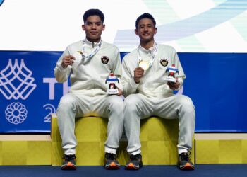 Alwi Farhan (kiri) dan Moh. Zaki Ubaidillah (kanan).(Foto: Humas PBSI)