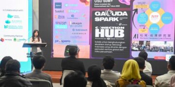 Menkomdigi Meutya Hafid menyampaikan keynote speech dalam acara Jabar Digital Ecosystem Report di Garuda Sparks Innovation Hub Bandung, Senin (05/01/2026). Foto: Ardi W/Komdigi