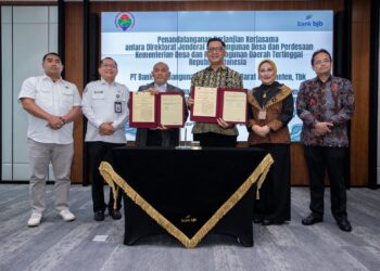 Perjanjian Kerja Sama tentang fasilitasi layanan Bank Pembangunan Daerah dalam mendukung percepatan pembangunan dan pemberdayaan masyarakat desa. Penandatanganan Perjanjian Kerja Sama dilakukan oleh Direktur Jenderal Pembangunan Desa dan Perdesaan Nugroho Setijo Nagoro dan Direktur Pengganti Direktur Utama bank bjb, Ayi Subarna.(Foto: Istimewa)