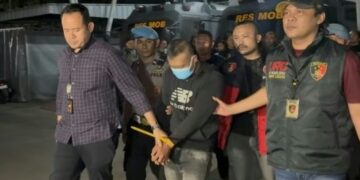 Taufik Hidayat (30), pelaku penyekapan dan penganiayaan saat dibawa ke Mapolda Jabar.(Foto:Istimewa).
