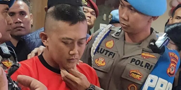 Taufik Hidayat (30), saat dihadirkan dalam konferensi pers di Mapolda Jawa Barat, Jum'at (26/06/2026).(Foto:Istimewa).
