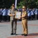 Satuan Polisi Pamong Praja (Satpol PP) Kabupaten Kuningan menerima Piagam Penghargaan Terbaik Operasi Pemberantasan Barang Kena Cukai Hasil Tembakau (BKCHT) Ilegal Tahun 2026 dari Gubernur Jawa Barat.(Foto: Humas Pemkab Kuningan)