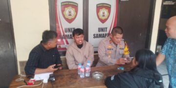 Pengemudi ojol, Diki Akbari, saat dimintai keterangan di Markas Polsek (Mapolsek) Cibeunying Kidul.(Foto:Istimewa).