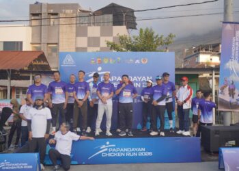 Bupati Garut, Abdusy Syakur Amin, secara resmi membuka Papandayan Chicken Run 2026 yang digelar di Jalan Ibrahim Adjie, Kecamatan Tarogong Kaler, Kabupaten Garut, Minggu (19/7/2026).(Foto: Humas Pemkab Garut)