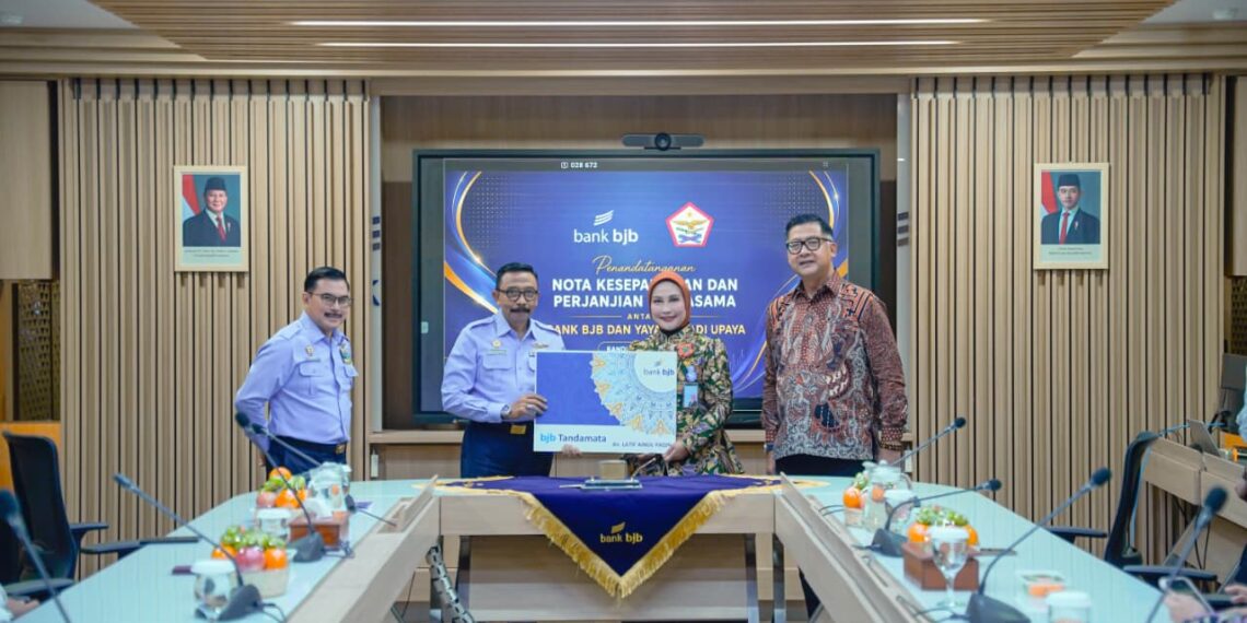 Penandatanganan Nota Kesepahaman dan Perjanjian Kerja Sama (PKS) antara bank bjb dan Yayasan Adi Upaya (Yasau), yang dilaksanakan pada Rabu, 29 Juli 2026, di Menara bank bjb, Bandung.(Foto: Dok. bank bjb)