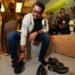 Menteri Ekonomi Kreatif/Kepala Badan Ekonomi Kreatif (Ekraf), Teuku Riefky Harsya mencoba salah satu produk sepatu di Jakarta Sneakers Day (JSD) Blok M Festival 2026, Jakarta, Jumat (31/07/2026).(Dok. Biro Komunikasi Kementerian Ekonomi Kreatif/Badan Ekonomi Kreatif)