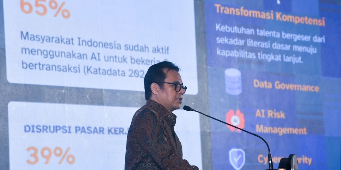 Wamenkomdigi Nezar Patria menyampaikan visionary speech dalam OJK Financial Innovation Day (Digination Day) Tahun 2026 di The Ritz-Carlton, Mega Kuningan, Jakarta Selatan, Kamis (27/08/2026). Wamen mengatakan perlu segera regulasi terkait agentic AI di sektor keuangan. (Foto: Pey HS/Komdigi)