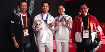 Pasangan ganda campuran bulu tangkis Indonesia, Amri Syahnawi/Nita Violina Marwah harus puas membawa pulang medali perak pada ajang Asian Games Aichi-Nagoya 2026. (foto:Gilang/kemenpora. go.id)
