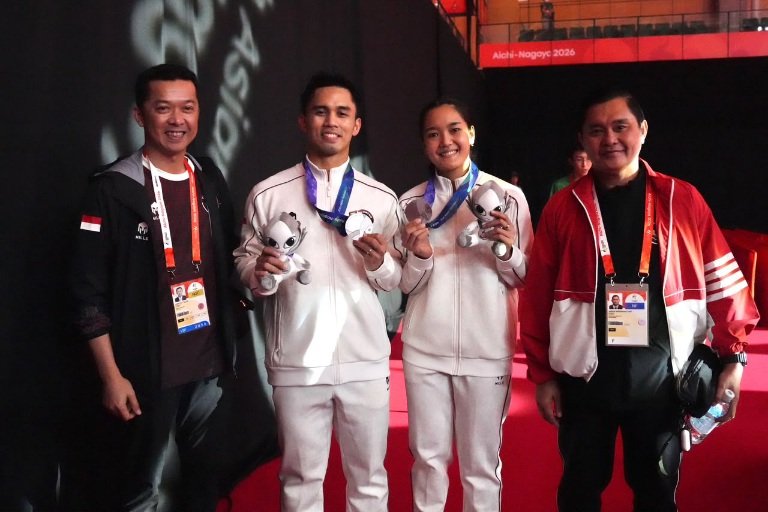 Pasangan ganda campuran bulu tangkis Indonesia, Amri Syahnawi/Nita Violina Marwah harus puas membawa pulang medali perak pada ajang Asian Games Aichi-Nagoya 2026. (foto:Gilang/kemenpora. go.id)
