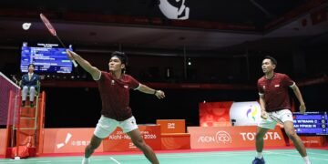 Ganda putra Indonesia Fajar Alfian/Muhammad Shohibul Fikri meraih medali perunggu Asian Games Aichi-Nagoya 2026 setelah kalah dari wakil China, Liang Weikeng/Wang Chang, dengan skor 17-21, 21-13, 9-21 pada babak semifinal. (dok.NOC/NMA)