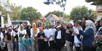 – Gelaran budaya dan olahraga tahunan Desa Suganangan, Kecamatan Cipicung, Kabupaten Kuningan kembali bergulir. Mengusung tajuk “Nyimas Lenggangherang Jilid 5: Sport n’ Ethno Carnaval”, kegiatan ini resmi dibuka pada Kamis (10/9/2026), bertempat di Stadion Rana Diraksa.(Foto: Diskominfo Kab. Kuningan)