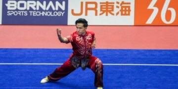 Atlet wushu putra Indonesia, Seraf Naro Siregar sukses menyumbangkan medali pertama bagi Indonesia pada ajang Asian Games 2026 di Aichi Perfectural Martial Arts Hall, Minggu (20/9).(foto:Gilang/kemenpora.go.id)