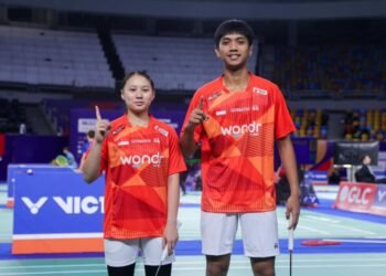 Reya Azzahra Yulianti dan Moses Andar Simanjuntak di BWF World Junior Championships.(Foto: Dok. PBSI)