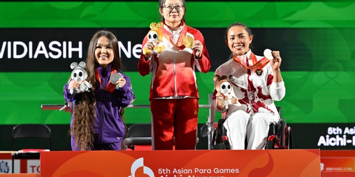 Di tengah cedera bahu yang belum sepenuhnya pulih, Ni Nengah Widiasih tetap mampu mengibarkan Merah Putih di podium Asian Para Games 2026.(dok.NPCI Via Kemenpora)